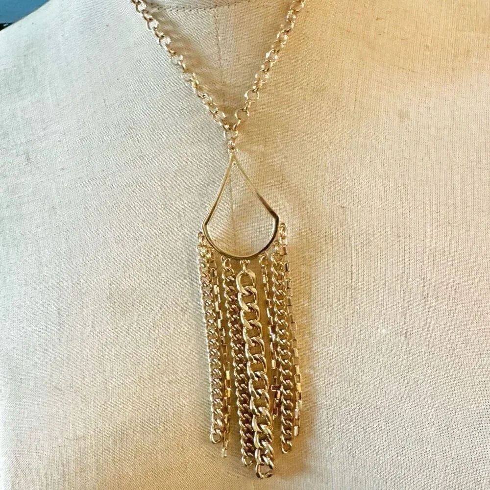 Gold tone long chain tassel pendant necklace